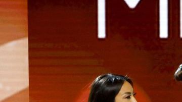 NEW ORLEANS, LOUISIANA - JANUARY 14: Jeannie Mai Jenkins, Olivia Culpo and Anne Jakrajutatip speak during The 71st Miss Universe Competition at New Orleans Morial Convention Center on January 14, 2023 in New Orleans, Louisiana. (Photo by Jason Kempin/Getty Images)