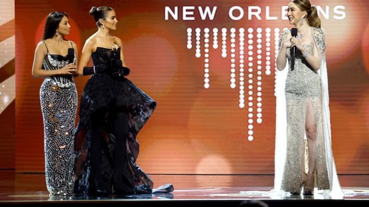 NEW ORLEANS, LOUISIANA - JANUARY 14: Jeannie Mai Jenkins, Olivia Culpo and Anne Jakrajutatip speak during The 71st Miss Universe Competition at New Orleans Morial Convention Center on January 14, 2023 in New Orleans, Louisiana. (Photo by Jason Kempin/Getty Images)