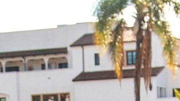 SANTA BARBARA, CA-NOVEMBER 30, 2023:Activist Edin Alex Enamorado, right, pursues Attorney Michael Barmasse, after the arraignment for his client Jeanne Umana at Santa Barbara Superior Court that was continued until January 3, 2024. Umana was caught on two separate videos using racist language to Latino men. As Enamorado followed Barmasse, he yelled out to him, "Are you aware that you're defending a racist bigot? She should be charged with a hate crime." (Mel Melcon / Los Angeles Times via Getty Images)
