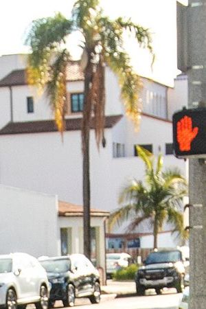 SANTA BARBARA, CA-NOVEMBER 30, 2023:Activist Edin Alex Enamorado, right, pursues Attorney Michael Barmasse, after the arraignment for his client Jeanne Umana at Santa Barbara Superior Court that was continued until January 3, 2024. Umana was caught on two separate videos using racist language to Latino men. As Enamorado followed Barmasse, he yelled out to him, "Are you aware that you're defending a racist bigot? She should be charged with a hate crime." (Mel Melcon / Los Angeles Times via Getty Images)