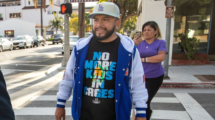 SANTA BARBARA, CA-NOVEMBER 30, 2023:Activist Edin Alex Enamorado, right, pursues Attorney Michael Barmasse, after the arraignment for his client Jeanne Umana at Santa Barbara Superior Court that was continued until January 3, 2024. Umana was caught on two separate videos using racist language to Latino men. As Enamorado followed Barmasse, he yelled out to him, "Are you aware that you're defending a racist bigot? She should be charged with a hate crime." (Mel Melcon / Los Angeles Times via Getty Images)