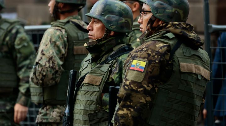 QUITO, ECUADOR - JANUARY 10: Military personnel stand guard at Presidency of the Republic on January 10, 2024 in Quito, Ecuador. President Noboa declared "internal armed conflict" after hooded and armed men broke into TC Television's live broadcast, among other violent incidents across the country on Tuesday. Ecuador has been hit by explosions, police kidnappings, and prison disturbances since Noboa on Monday declared a nationwide state of emergency after gang leader Adolfo "Fito" Macias escaped from a prison in Guayaquil. (Photo by Franklin Jacome/Agencia Press South/Getty Images)
