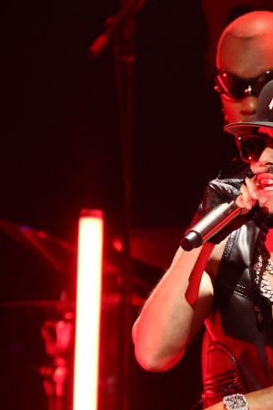 MIAMI, FLORIDA - OCTOBER 21: Yandel performs onstage during the 2023 iHeart Fiesta Latina at Kaseya Center on October 21, 2023 in Miami, Florida. (Photo by Arturo Holmes/Getty Images FOR iHeartRadio)