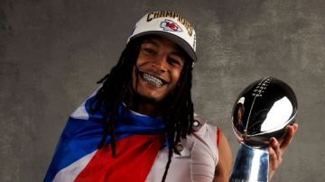 LAS VEGAS, NEVADA - FEBRUARY 11: Isiah Pacheco #10 of the Kansas City Chiefs poses for a portrait with the Vince Lombardi Trophy after Super Bowl LVIII against the San Francisco 49ers at Allegiant Stadium on February 11, 2024 in Las Vegas, Nevada. (Photo by Ryan Kang/Getty Images)