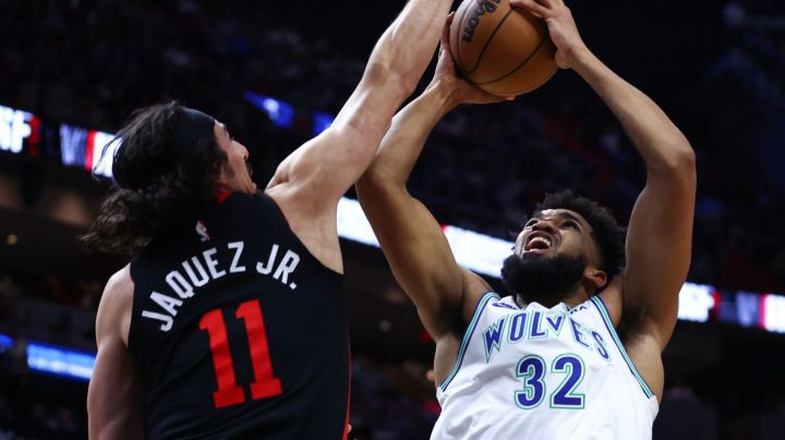 MIAMI, FLORIDA - DECEMBER 18: Jaime Jaquez Jr. #11 of the Miami Heat blocks a shot by Karl-Anthony Towns #32 of the Minnesota Timberwolves during the first quarter of the game at Kaseya Center on December 18, 2023 in Miami, Florida. NOTE TO USER: User expressly acknowledges and agrees that, by downloading and or using this photograph, User is consenting to the terms and conditions of the Getty Images License Agreement. (Photo by Megan Briggs/Getty Images)