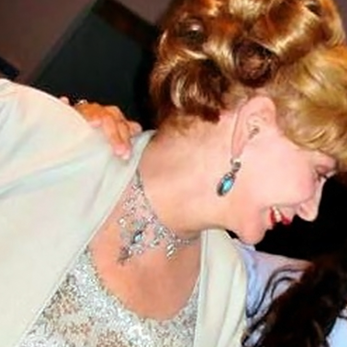 Carmen Cusido with her parents at her graduation