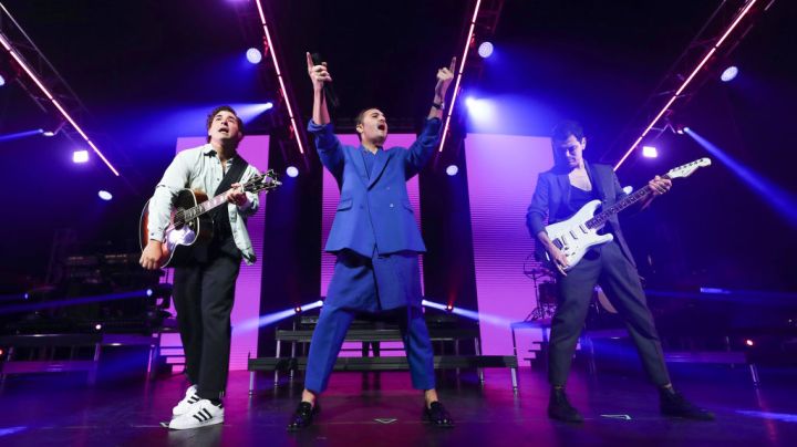 GRAND PRAIRIE, TX - MAY 19: (L-R) Julio Ramirez, Jesus Navarro and Bibi Marin of Reik perform on stage during "Encambio" USA Tour 2022 at Texas Trust CU Theatre on May 19, 2022 in Grand Prairie, Texas. (Photo by Omar Vega/Getty Images)