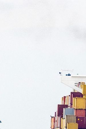 BALTIMORE, MARYLAND - MARCH 26: The cargo ship Dali sits in the water after running into and collapsing the Francis Scott Key Bridge on March 26, 2024 in Baltimore, Maryland. According to reports, rescuers are still searching for multiple people, while two survivors have been pulled from the Patapsco River. A work crew was fixing potholes on the bridge, which is used by roughly 30,000 people each day, when the ship struck at around 1:30am on Tuesday morning. The accident has temporarily closed the Port of Baltimore, one of the largest and busiest on the East Coast of the U.S. (Photo by Tasos Katopodis/Getty Images)