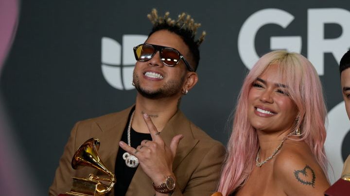 SEVILLE, ANDALUSIA, SPAIN - NOVEMBER 17: Singers Obi no the droo, Karol G and Santiago Alvarado, pose with the 3 Grammys they have been awarded during the Latin Grammy 2023 awards gala, at the Palacio de Congresos de Sevilla, on November 16, 2023, in Seville, Andalusia, Spain. Seville today hosted the 24th edition of the Latin Grammy Awards, which recognize artistic and technical excellence in Ibero-American music. This is the first time since 2000 that the Latin Grammy Awards have been held outside the United States and also the first time that the awards ceremony has been broadcast internationally. The gala could be followed on La 1 and RTVE Play. (Photo By Joaquin Corchero/Europa Press via Getty Images)
