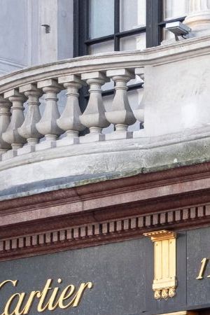 People look in the window of the Cartier store on Bond Street on 7th April 2024 in London, United Kingdom. Bond Street is one of the principal streets in the West End shopping district and is very upmarket. It has been a fashionable shopping street since the 18th century. The rich and wealthy shop here mostly for high end fashion and jewellery. (photo by Mike Kemp/In Pictures via Getty Images)