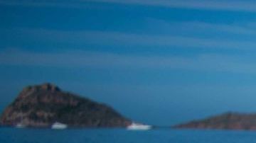 MAZATLAN, MEXICO - APRIL 08: A person watches the total solar eclipse at the beach on April 8, 2024 in Mazatlán, Mexico. Millions of people have flocked to areas across North America that are in the path of totality in order to experience a total solar eclipse. During the event, the moon will pass in between the sun and the Earth, appearing to block the sun. (Photo by Miguel Martínez Corona/ObturadorMX/Getty Images)