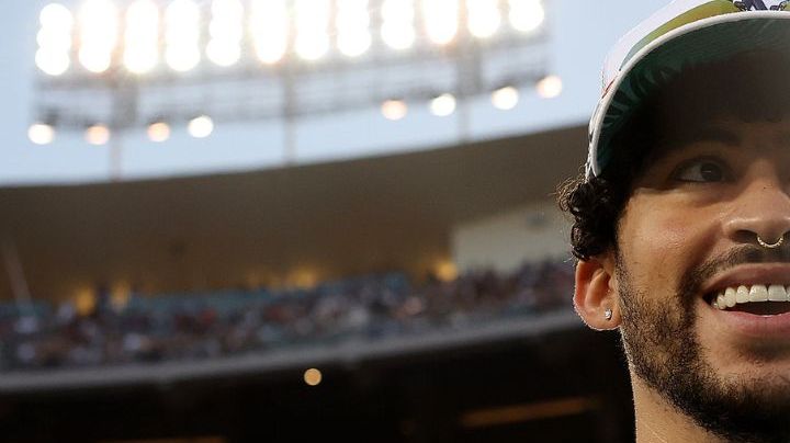 LOS ANGELES, CA - JULY 16: Bad Bunny looks on during the MGM All-Star Celebrity Softball Game at Dodger Stadium on Saturday, July 16, 2022 in Los Angeles, California. (Photo by Mary DeCicco/MLB Photos via Getty Images)