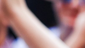 A fan holds a banner in support of Sergio Perez of Mexico and Oracle Red Bull Racing in the fan zone prior to the Sprint Shootout ahead of the F1 Grand Prix of United States at Circuit of The Americas on October 21, 2023 in Austin, Texas. Photo by Mark Thompson/Getty Images