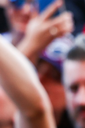 A fan holds a banner in support of Sergio Perez of Mexico and Oracle Red Bull Racing in the fan zone prior to the Sprint Shootout ahead of the F1 Grand Prix of United States at Circuit of The Americas on October 21, 2023 in Austin, Texas. Photo by Mark Thompson/Getty Images