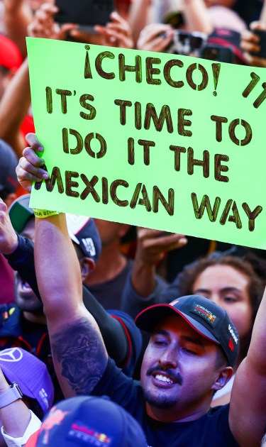 A fan holds a banner in support of Sergio Perez of Mexico and Oracle Red Bull Racing in the fan zone prior to the Sprint Shootout ahead of the F1 Grand Prix of United States at Circuit of The Americas on October 21, 2023 in Austin, Texas. Photo by Mark Thompson/Getty Images