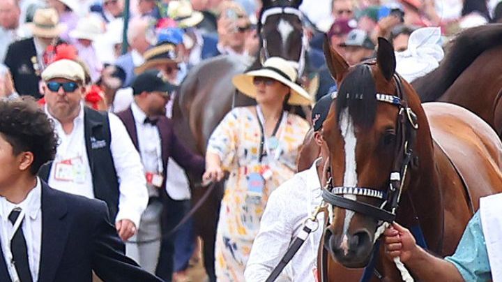 LOUISVILLE, KY - MAY 04: Mystik Dan walks from the backside of the track with Oswaldo Salazar to the paddock before the 150th running of the Kentucky Derby on May 4, 2024, at Churchill Downs in Louisville, Ky. (Photo by Jeff Moreland/Icon Sportswire via Getty Images)