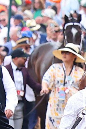 LOUISVILLE, KY - MAY 04: Mystik Dan walks from the backside of the track with Oswaldo Salazar to the paddock before the 150th running of the Kentucky Derby on May 4, 2024, at Churchill Downs in Louisville, Ky. (Photo by Jeff Moreland/Icon Sportswire via Getty Images)
