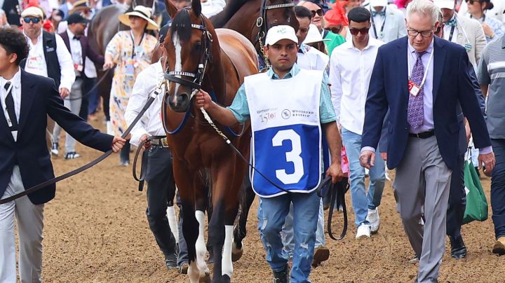 LOUISVILLE, KY - MAY 04: Mystik Dan walks from the backside of the track with Oswaldo Salazar to the paddock before the 150th running of the Kentucky Derby on May 4, 2024, at Churchill Downs in Louisville, Ky. (Photo by Jeff Moreland/Icon Sportswire via Getty Images)