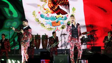 Ricardo Yocupicio and Geovanni Mondragón of Banda El Recodo performs on stage during a concert at Parque Bicentenario on March 4, 2023 in Mexico City, Mexico. Photo by Adrián Monroy/Medios y Media/Getty Images