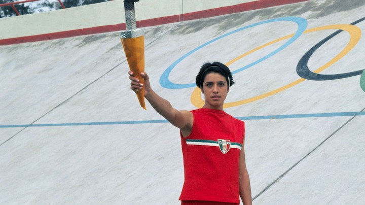 Enriqueta Basilio Waving on Olympic Grounds
