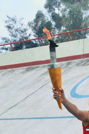 Enriqueta Basilio Waving on Olympic Grounds