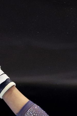 MINNEAPOLIS, MINNESOTA - JUNE 30: Hezly Rivera prepares for her uneven bars routine on Day Four of the 2024 U.S. Olympic Team Gymnastics Trials at Target Center on June 30, 2024 in Minneapolis, Minnesota. (Photo by Elsa/Getty Images)