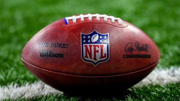 DETROIT, MICHIGAN - OCTOBER 08: The NFL logo is pictured on a Wilson brand football before the game between the Detroit Lions and Carolina Panthers at Ford Field on October 08, 2023 in Detroit, Michigan. (Photo by Nic Antaya/Getty Images)