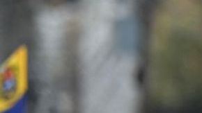 Police officers stand guard next to demonstrators waving Venezuelan flags during a protest against Venezuelan President Nicolas Maduro's government in Caracas on July 29, 2024, a day after the Venezuelan presidential election. Protests erupted in parts of Caracas Monday against the re-election victory claimed by Venezuelan President Nicolas Maduro but disputed by the opposition and questioned internationally, AFP journalists observed. (Photo by Yuri CORTEZ / AFP) (Photo by YURI CORTEZ/AFP via Getty Images)