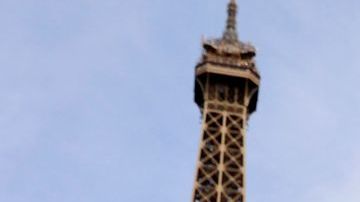 PARIS, FRANCE - JUNE 17: The Paris 2024 logo is displayed near the Eiffel Tower before the start of the Paris 2024 Olympic and Paralympic Games on June 17, 2024 in Paris, France. The city is gearing up to host the XXXIII Olympic Summer Games, from 26 July to 11 August. (Photo by Chesnot/Getty Images)