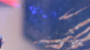 NEW YORK, NY - DECEMBER 01:  The Edge and Chris Martin of Coldplay perform as "U2 - 1" in a surprise concert by (RED) to mark World AIDS Day in Times Square on December 1, 2014 in New York City.  (Photo by Taylor Hill/FilmMagic)