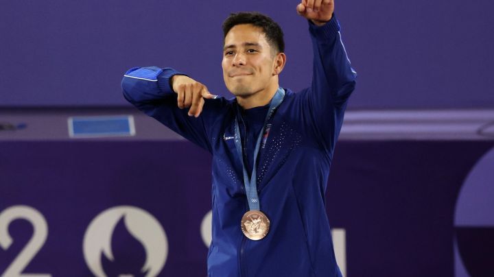 PARIS, FRANCE - AUGUST 10: Bronze medalist B-Boy Victor of Team United States celebrates on the podium during the Breaking B-Boys medal ceremony after the Breaking B-Boys Battles on day fifteen of the Olympic Games Paris 2024 at Place de la Concorde on August 10, 2024 in Paris, France. (Photo by Steph Chambers/Getty Images)