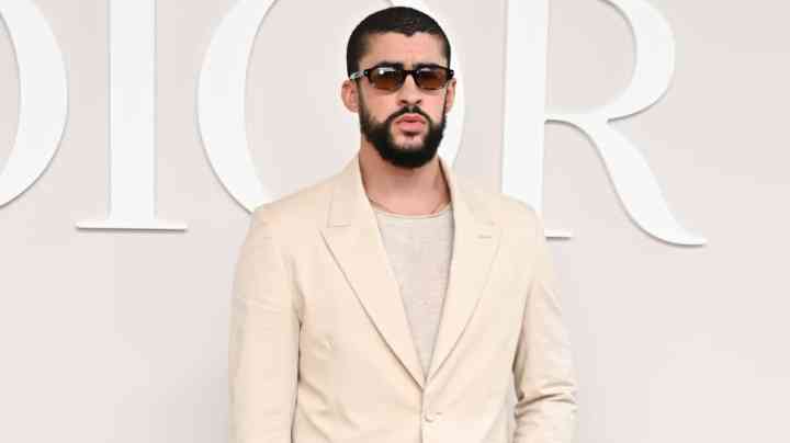 PARIS, FRANCE - JUNE 21: (EDITORIAL USE ONLY - For Non-Editorial use please seek approval from Fashion House) Bad Bunny attends the Dior Homme Menswear Spring/Summer 2025 show as part of Paris Fashion Week on June 21, 2024 in Paris, France. (Photo by Stephane Cardinale - Corbis/Corbis via Getty Images)