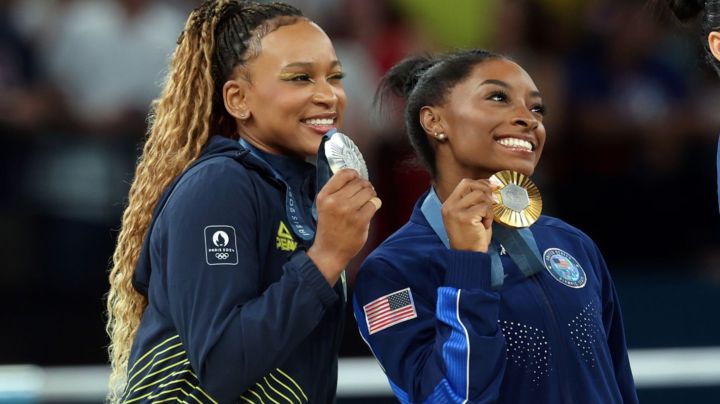 PARIS, FRANCE - AUGUST 01: Silver medal winner Rebeca Andrade of Brazil, Gold medalist and winner Simone Biles of USA and Bronze medal winner Sunisa Lee of USA (L-R) celebrate with the medals after the women's Artistic Gymnastics All-Around Final on day six of the Olympic Games Paris 2024 at Bercy Arena on August 01, 2024 in Paris, France. (Photo by Stefan Matzke - sampics/Getty Images)
