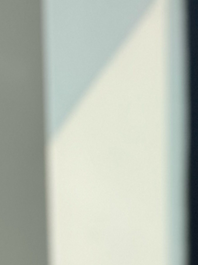 Oscar Bastidas with Macro Mac, a small, plastic toy that transformed from McDonald’s signature Big Mac hamburger into a robot.