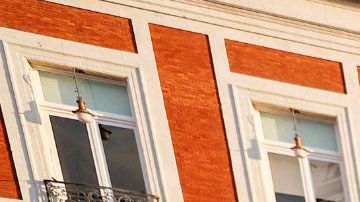 Demonstrators hold a giant national flag of Venezuela during a protest against Venezuelan President Nicolas Maduro's disputed victory in the country's Presidential elections, at Puerta del Sol, Madrid, on August 3, 2024. (Photo by OSCAR DEL POZO / AFP) (Photo by OSCAR DEL POZO/AFP via Getty Images)