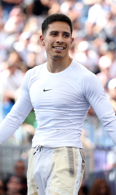 PARIS, FRANCE - AUGUST 10: B-Boy Victor of Team United States competes with B-Boy Shigekix of Team Japan (not pictured) in the Breaking B-Boys Round Robin Group A battle on day fifteen of the Olympic Games Paris 2024 at Place de la Concorde on August 10, 2024 in Paris, France. (Photo by Elsa/Getty Images)