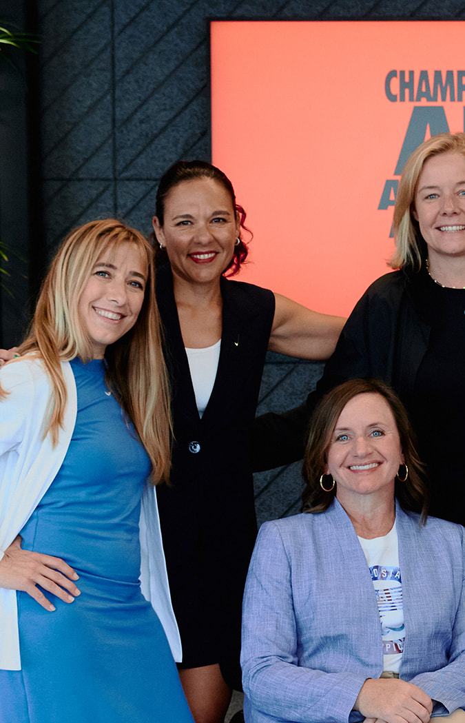 Nike and the USOPC announced the GameOn program at an event in Paris. From left to right, Sarah Reinertsen, Paralympian and Nike Lead Professional, Sports Marketing; Vanessa Garcia-Brito, Nike Chief Impact Officer; Sarah Hirshland, CEO, U.S. Olympic & Paralympic Committee; James Loduca, Nike Vice President, Diversity, Equity, Inclusion; seated is Dr. Cheri Blauwet, Paralympian and Sports Medicine Physician, Professor at Harvard Medical School, and Chief Medical Officer of Spaulding Rehabilitation/Mass General Brigham.