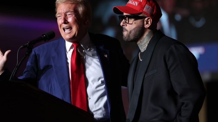 LAS VEGAS, NEVADA - SEPTEMBER 13: Republican presidential nominee, former U.S. President Donald Trump, (L) appears on stage with recording artist Nicky Jam during a campaign rally at The Expo at World Market Center Las Vegas on September 13, 2024 in Las Vegas, Nevada. With 53 days before election day, Former President Trump continues to campaign. (Photo by Justin Sullivan/Getty Images)