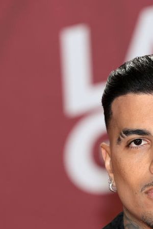 MIAMI, FLORIDA - NOVEMBER 14: Rauw Alejandro attends the 25th Latin GRAMMY Awards at Kaseya Center on November 14, 2024 in Miami, Florida. (Photo by Dimitrios Kambouris/Getty Images for The Latin Recording Academy)