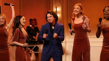 SNL -- Episode 1867 -- Pictured: (l-r) Sarah Sherman, host Ariana Grande, Marcello Hernández as Domingo, Heidi Gardner, and Ego Nwodim during the “Bridesmaid Speech” sketch on Saturday, October 12, 2024 -- (Photo by: Will Heath/NBC)