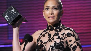 LOS ANGELES, CA - NOVEMBER 20: Singer Jennifer Lopez accepts the Latin Music Favorite Artist award onstage at the 2011 American Music Awards held at Nokia Theatre L.A. LIVE on November 20, 2011 in Los Angeles, California. (Photo by Kevin Winter/AMA2011/Getty Images for AMA)