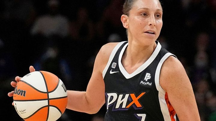 FILE - Phoenix Mercury guard Diana Taurasi (3) dribbles during the first half of Game 2 of basketball's WNBA Finals against the Chicago Sky, Wednesday, Oct. 13, 2021, in Phoenix. (AP Photo/Rick Scuteri, File)