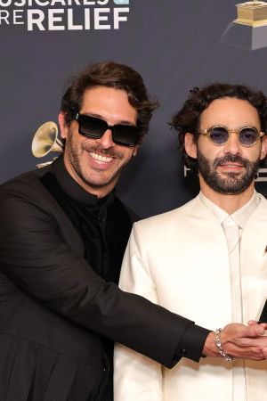 LOS ANGELES, CALIFORNIA - FEBRUARY 02: (L-R) Alejandro Abeijón, Alberto Montenegro, Antonio Casas, and Andrés Story of Rawayana winners of the Best Latin Rock or Alternative Album for “¿Quién trae las cornetas?”, poses in the press room during the 67th Annual GRAMMY Awards at Crypto.com Arena on February 02, 2025 in Los Angeles, California.  (Photo by Monica Schipper/Getty Images for The Recording Academy)