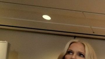 President Donald Trump, from right, speaks to reporters accompanied by Interior Secretary Doug Burgum and Burgum's wife Kathryn Burgum, aboard Air Force One where Trump signed a proclamation declaring Feb. 9 Gulf of America (Gulf of Mexico) Day, as he travels from West Palm Beach, Fla. to New Orleans, Sunday, Feb. 9, 2025. (AP Photo/Ben Curtis)
