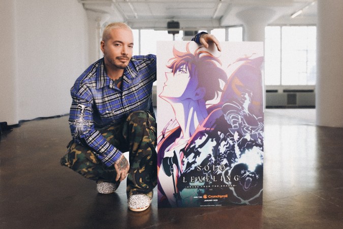 J Balvin with poster for Solo Leveling season 2