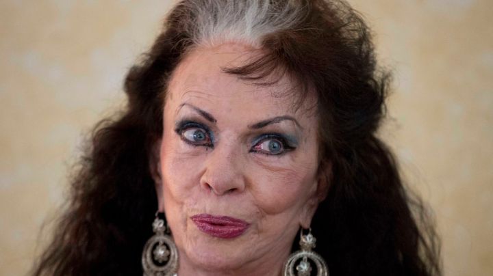 FILE - Dancer Yolanda Montez, better known by her stage name Tongolele, gives an interview in Mexico City, March 18, 2014. (AP Photo/Eduardo Verdugo, File)