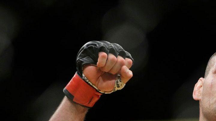 Cain Velasquez celebrates after defeating Travis Browne in their heavyweight mixed martial arts bout at UFC 200, Saturday, July 9, 2016, in Las Vegas. (AP Photo/John Locher)