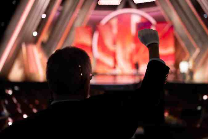 Oscars stage hand by teleprompter