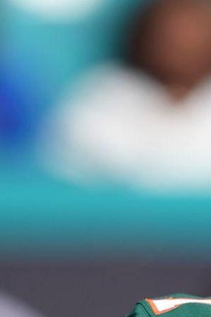 Miami wide receiver Xavier Restrepo (7) is introduced on Senior Day before an NCAA college football game against Wake Forest, Saturday, Nov. 23, 2024, in Miami Gardens, Fla. (AP Photo/Lynne Sladky)