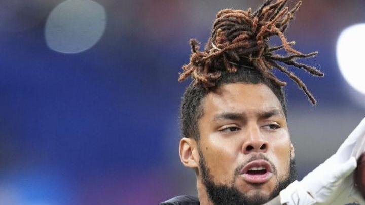 Miami running back Damien Martinez runs a drill at the NFL football scouting combine in Indianapolis, Saturday, March 1, 2025. (AP Photo/Michael Conroy)